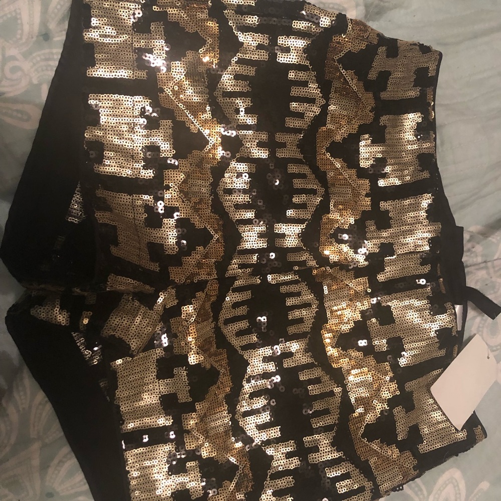 Black and gold sequin shorts